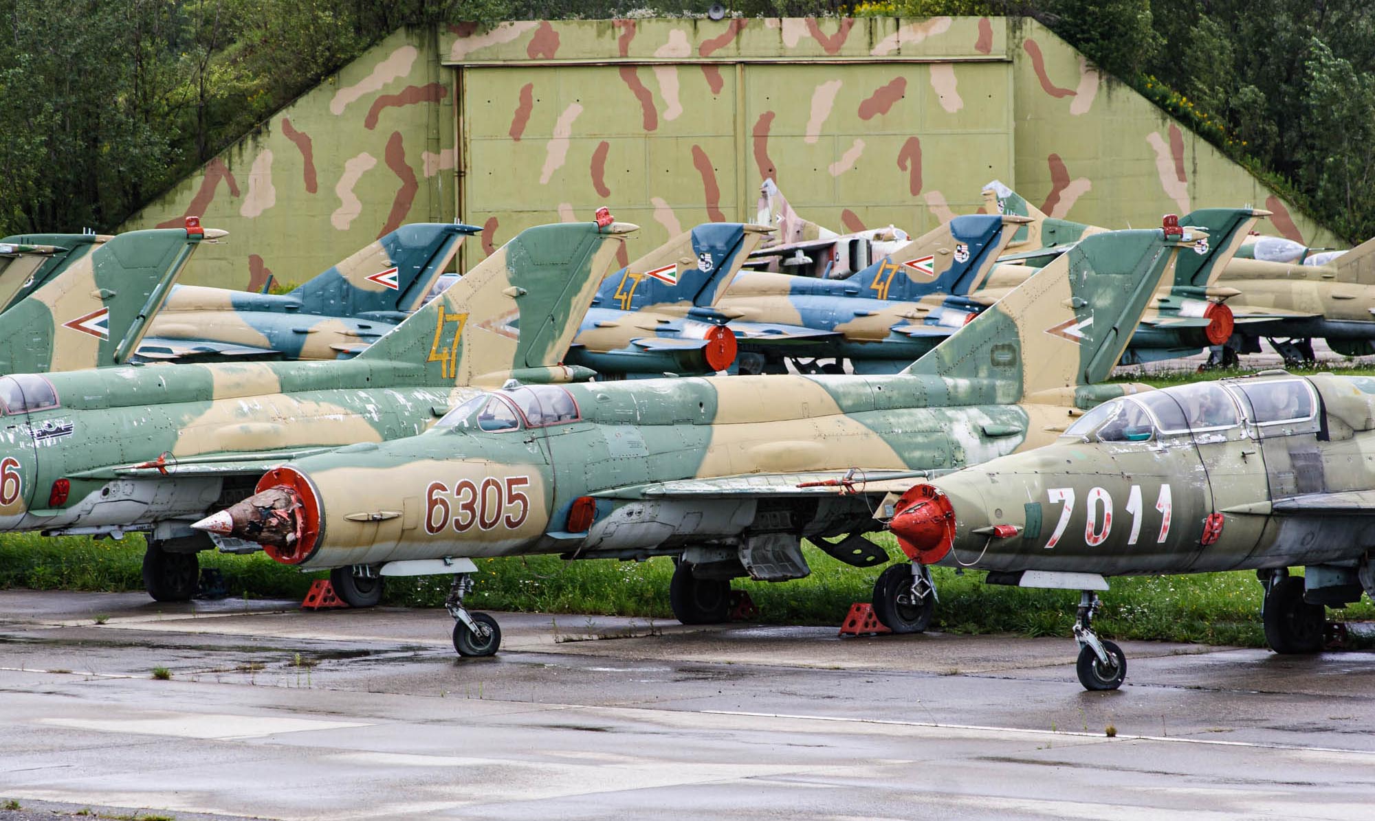 Various MiG-21 variants with some MiG-23's in the background Papa Air Base Hungary